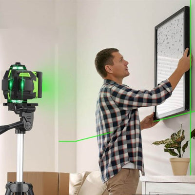 laser rotatif homme accroche un cadre